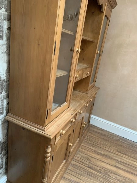 Solid pine Welsh dresser, bookcase, table with 6 chairs and a matching mirror