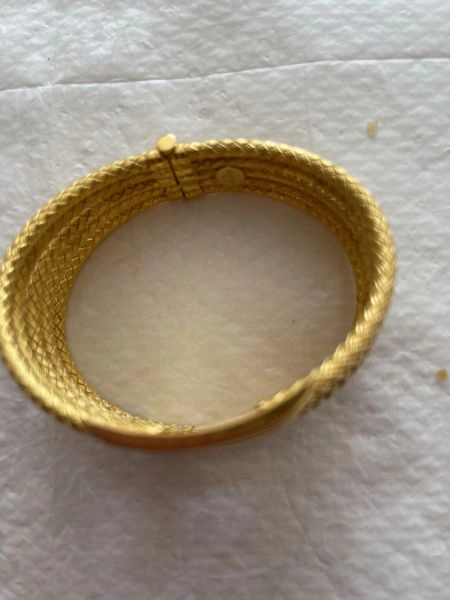 Brand new ladies rigid 14 carat gold bracelet