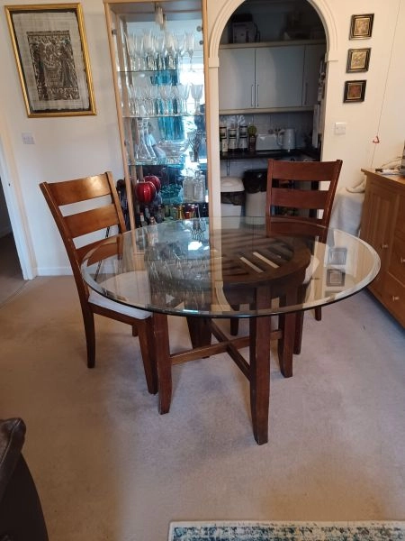Round dining table with two chairs