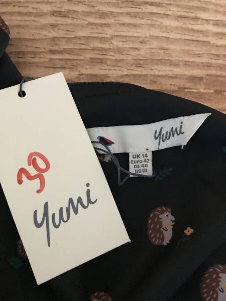 Yumi Black Pinafore Dress with Hedgehog Print Design