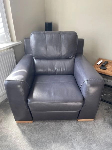 Grey leather sofas and recliner chair