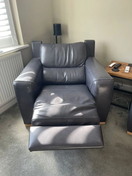 Grey leather sofas and recliner chair