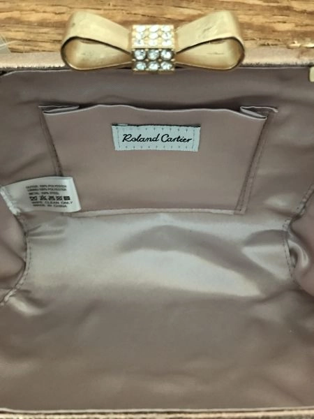 Roland cartier pink shiny clutches bag