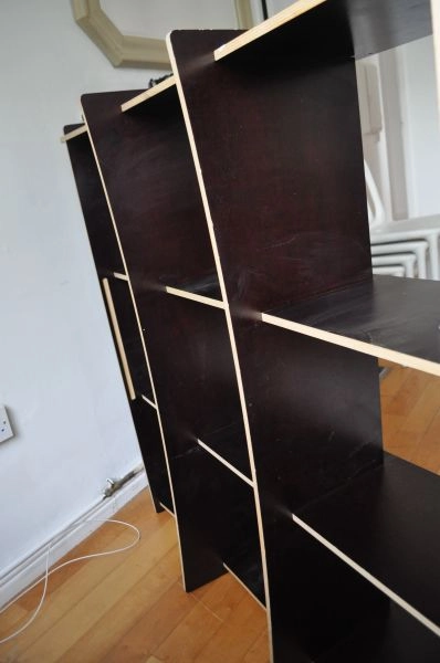 Designer black painted wooden shelf