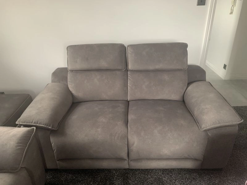 Brand new 2 seater sofa with adjustable headrests