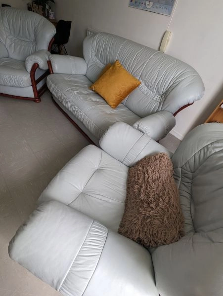 Leather sofa and two armchairs