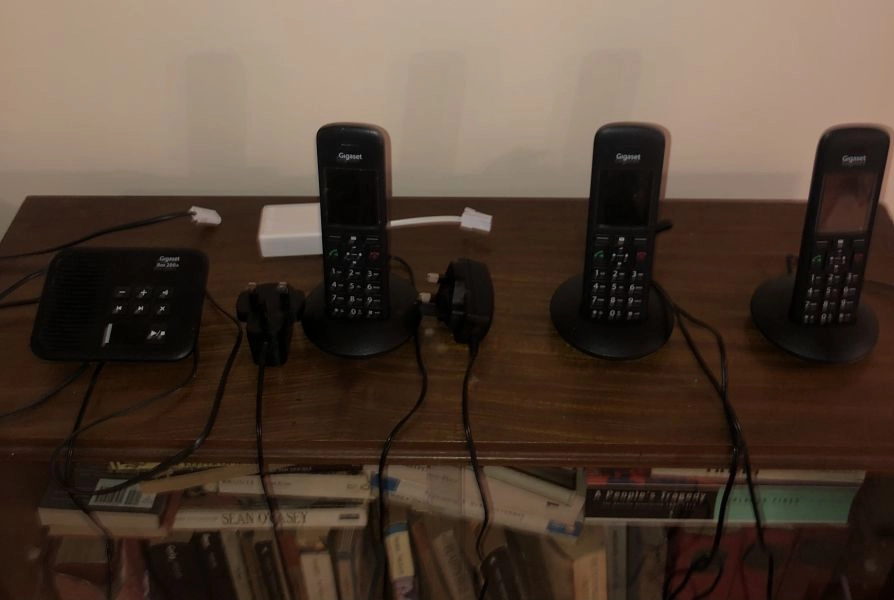 Gigaset landline answering machine with two great cordless phones, plus spare cordless phone with base but no charging plug.