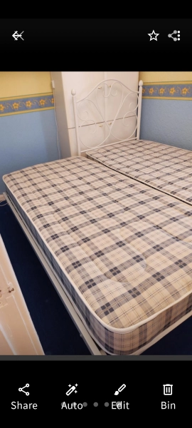 Single bed trundle Guest bed white metal frame 3ft single trundle bed on rolling wheels, will roll under existing single bed for storing away, immaculate condition, also a single mattress included Cash on collection please Lowton area WA3 2NH