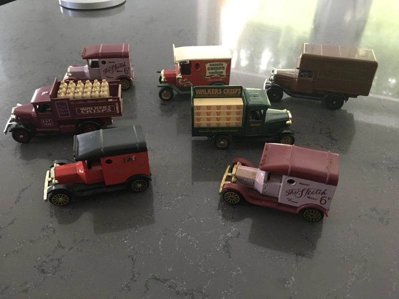 Seven Corgi collectible Vehicles