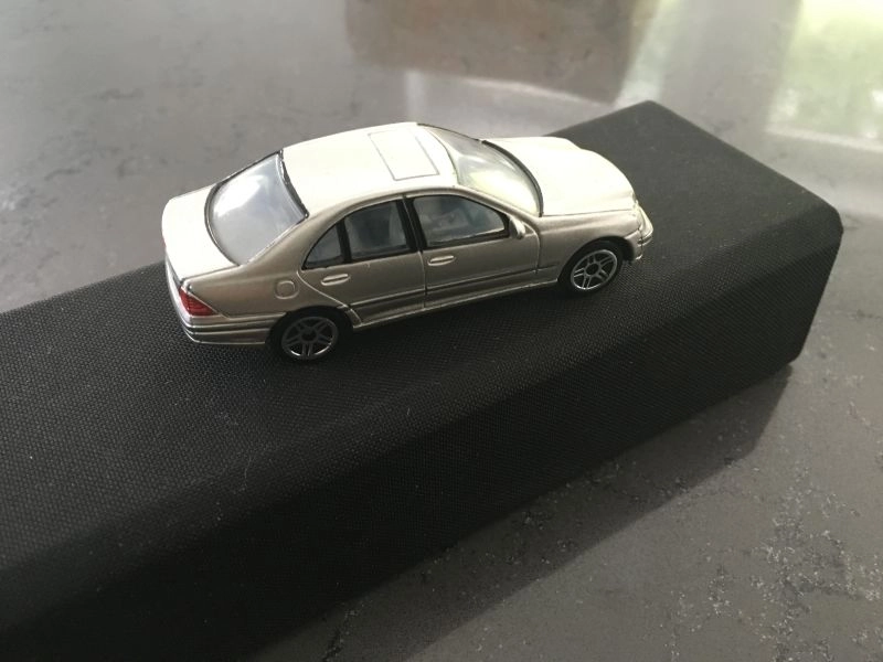 Maisto BMW scale model and Mercedes Benz.