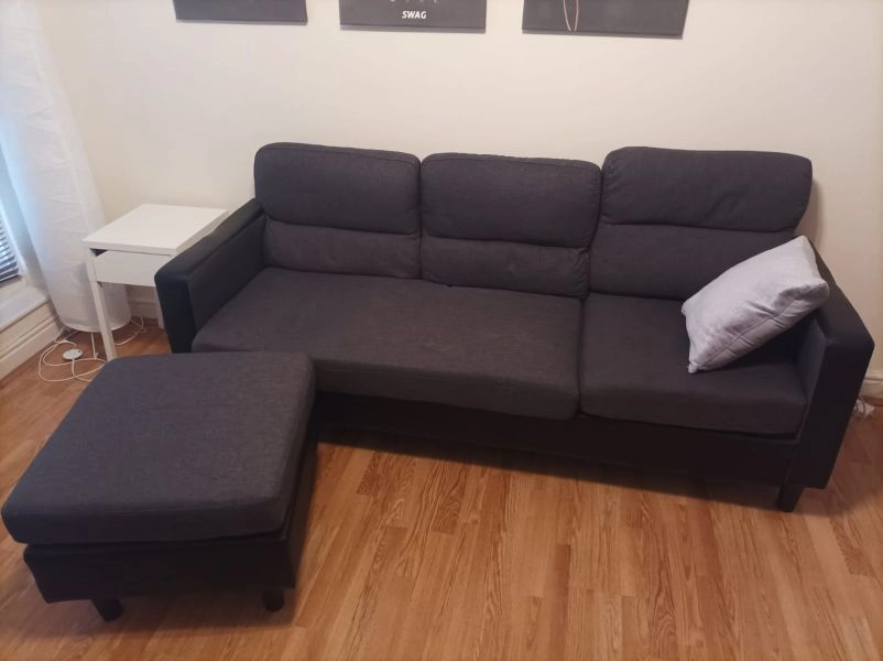 Three seater sofa with foot stool
