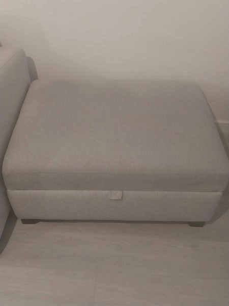 Grey 3 seat sofa bed , footstool with store & round black table with 4 chairs