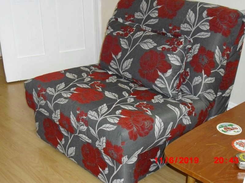FOR SALE A DREAMWORKS UPHOLSTERED CHAIR IN EXCELLENT CONDITION. OFFERS OVER £100.00.