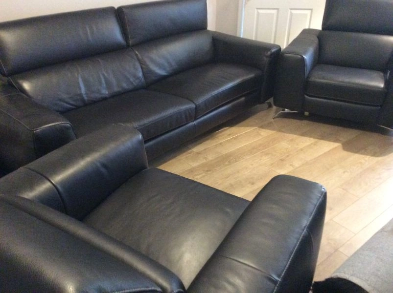 Three piece leather suite