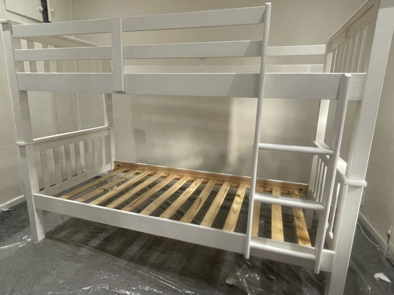 Trundle white single bunk bed with mattresses