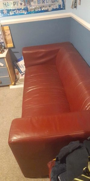 Great Condition red leather sofa