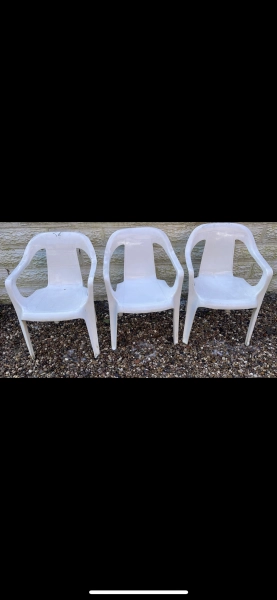 X3 plastic white chairs