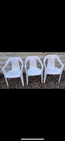 X3 plastic white chairs