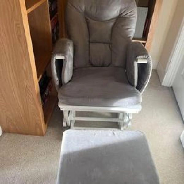 Grey rocking/nursing chair. Like new
