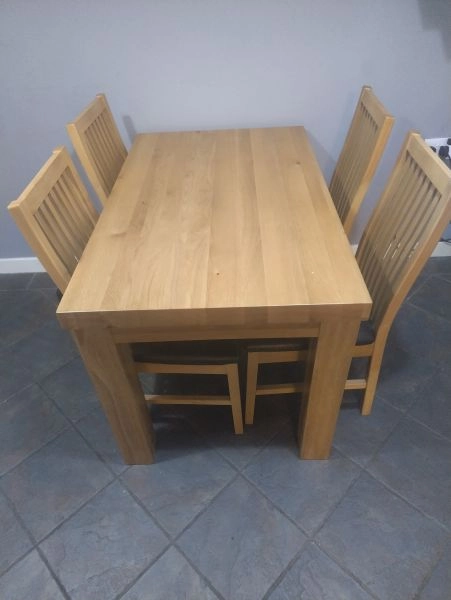 Dining table and chairs for sale.