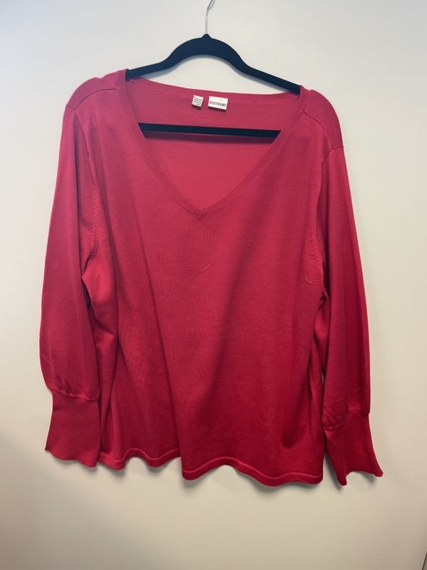 Set of pink and red jumpers