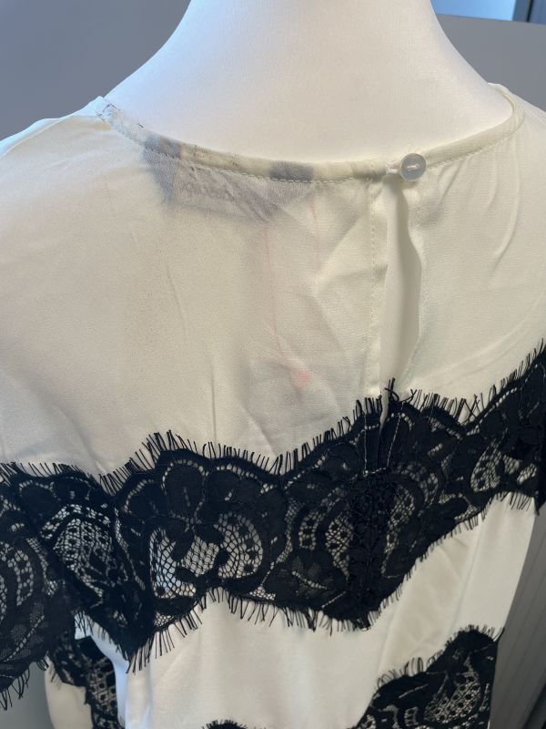 Lace peplum white and black top