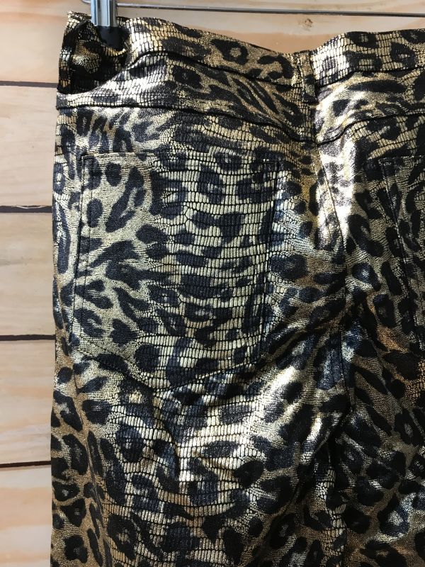 Gold leopard print trousers