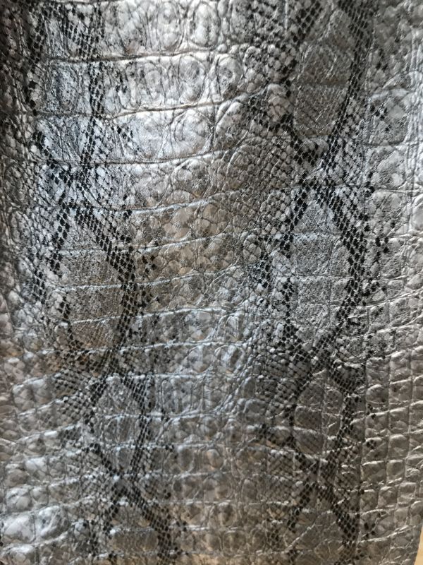 Silver snake print trousers