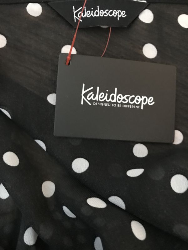 Kaleidoscope Black Dress with White Polka Dots
