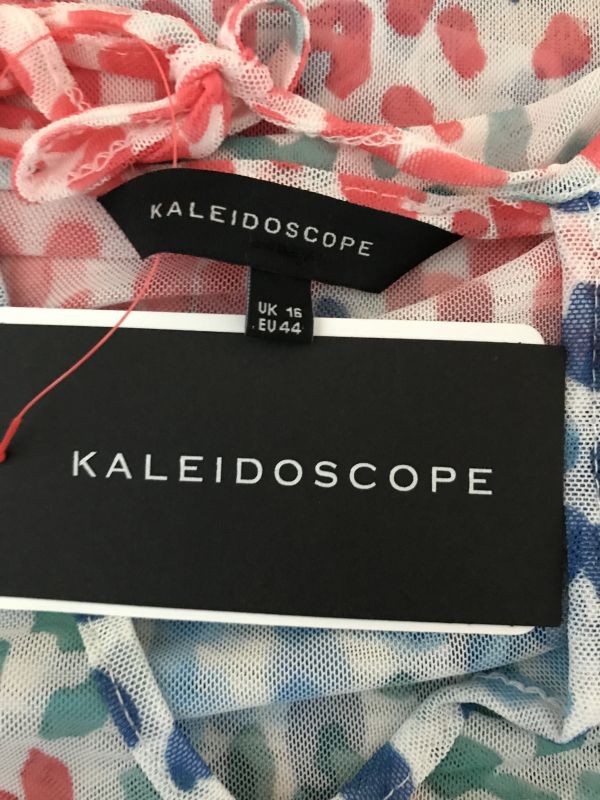 Kaleidoscope White Top with Red, Blue and Green Animal Print