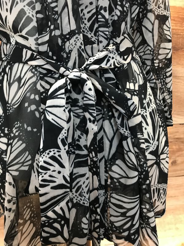 White and black butterfly print top