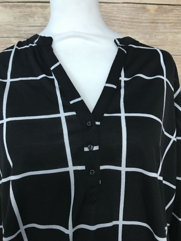 Black and white checkered top